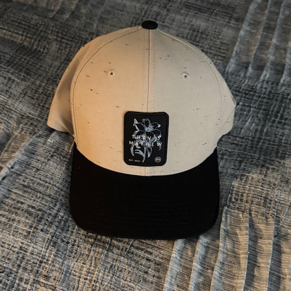 Travis Mathew Two Tone Black and Cream Cap never worn